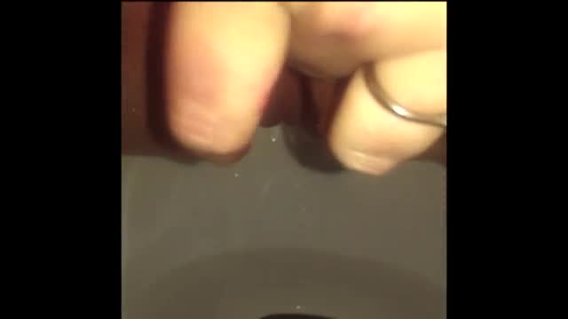 Squirting in the bathroom with a dildo